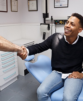 man shaking hands with his dentist 