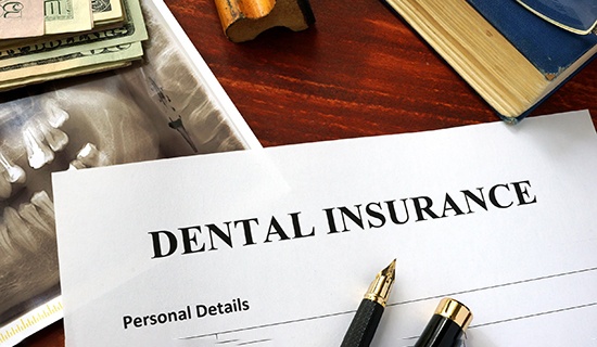 Dental insurance form on desk