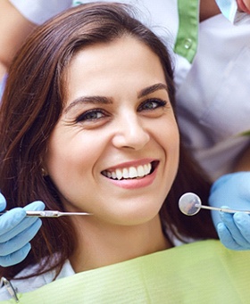 Woman visiting dentist in Mangum