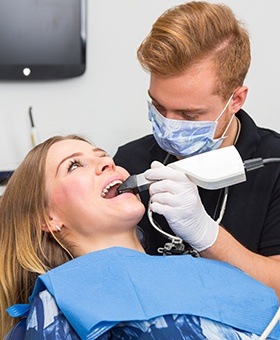 Dental team member capturing digital bite impressions