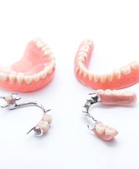 two full dentures and two partials