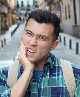 Man with toothache has questions for his Mangum emergency dentist