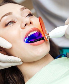 Woman receiving dental treatment