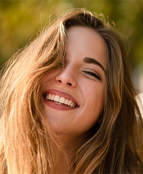 Young woman smiling with tooth-colored filling in Mangum