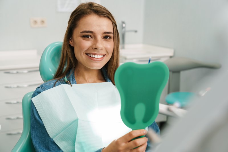 patient smiling in the dental chair