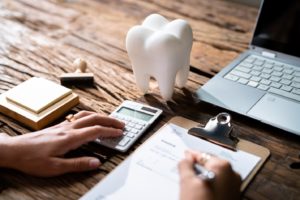 a patient using dental insurance to pay for treatment