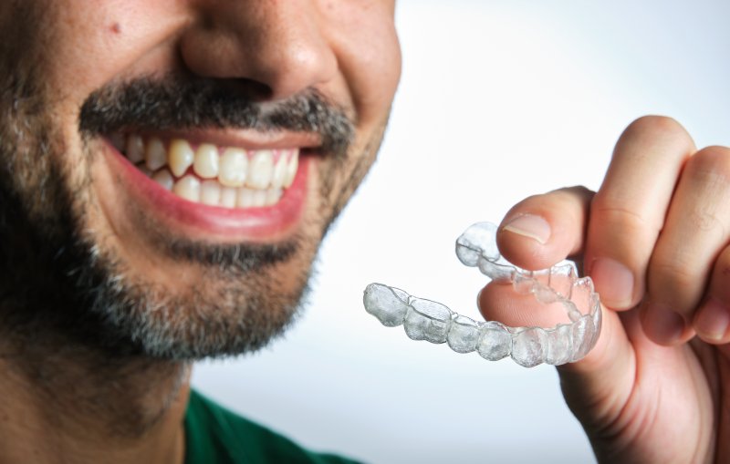 A man with his Invisalign